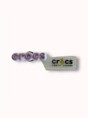 FREE WITH $30+ Crocs lavender logo Jibbitz